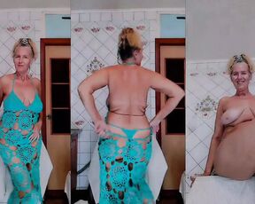 Funny Striptease of a Hot Housewife in the Kitchen