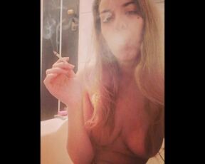 Sexy Smoking in Bathroom. Blonde little Smoker